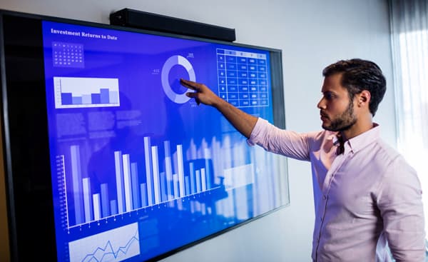 A Wci Data Analytics Consultant Interpreting Client Data.